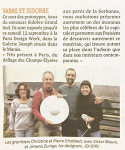 Article de La Dépêche sur le granit du Sidobre à la Paris Design Week, photo des granitiers et des designers